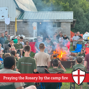 Praying the Rosary by the camp fire